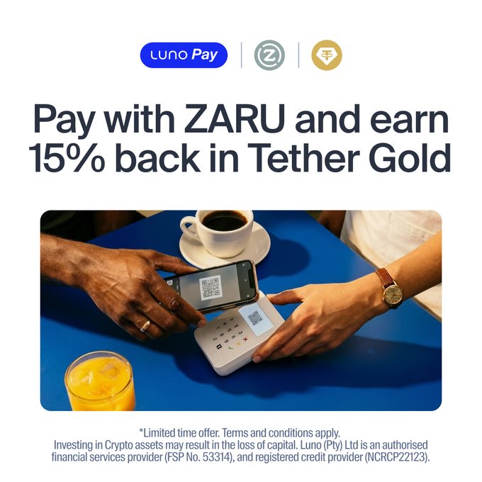 The image shows a person holding a phone up next to a table with an object on it, likely a cup of coffee or juice. The text below the photo promotes a mobile payment platform called LunoPay, which allows users to transfer money between accounts using their phone. It also encourages people to take advantage of the 15% back reward for making transactions through this app on tether gold. This offers an opportunity for users to increase their purchasing power by earning additional funds as they make purchases or transfers.