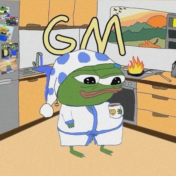A cartoon illustration of a Pepe the Frog character wearing a blue and white polka-dot nightcap and robe, holding a mug, with the text 'GM' above him in a kitchen setting.