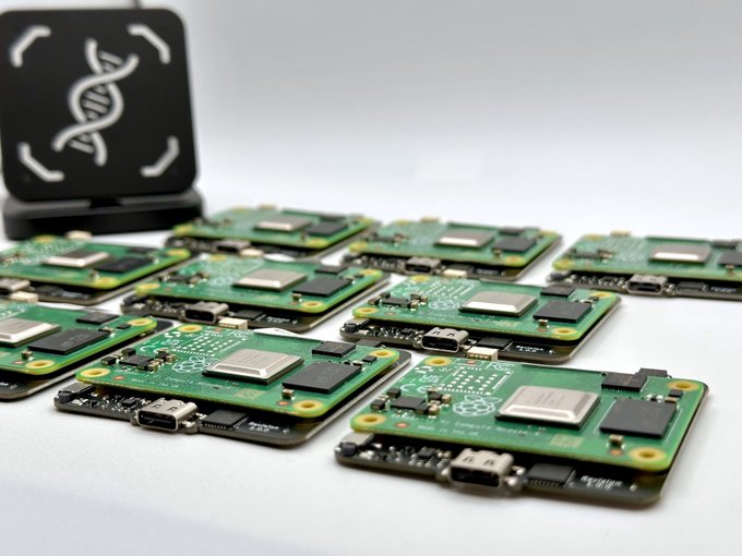 urn of green electronic components, including a Raspberry Pi board with a circuit board and a black box containing more boards.