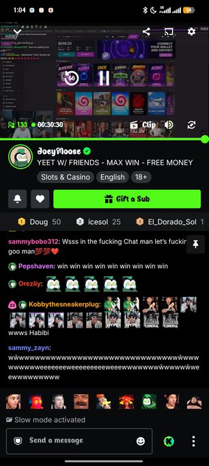 A screenshot of a Twitch livestream shows a streamer playing a slot machine game titled 'YEET W/ FRIENDS - MAX WIN - FREE MONEY' under the username 'JoeyTrIose', with a chat scrolling below.