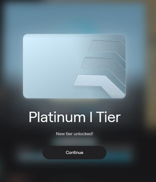 A mobile app notification screen announcing 'Platinum I Tier' with 'New tier unlocked!' and a Continue button.