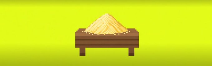 A simple pixel art graphic showing a brown wooden table with a pile of shredded cheese or similar light-colored granular material on top, against a solid yellow background.