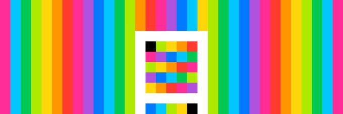 A colorful image featuring vertical rainbow stripes with a smartphone displaying a colorful block pattern on its screen in the center.
