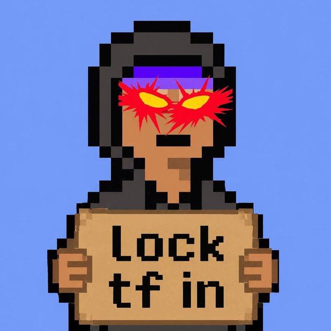 A pixel art style image of a character with a red spiky mask and yellow eyes, wearing a black helmet, holding a cardboard sign that reads 'Lock tf in'.