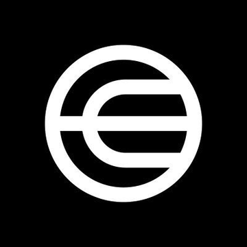 The image displays a symbol composed of a white circle with a vertical line running through it, creating an elongated "E". The text at the bottom of the image reads "$WLD's" which translates to "Breaking: WLD's trading volume has surpassed $1.23B and is rising 6.5%." This suggests that there might be some significant financial news or events related to this company in the near future.