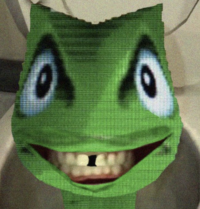 The image shows a green cartoon frog-like face mask with a toothy grin being held up by a person's hands. The image doesn't contain any text, numbers, or tickers, but the playful, internet-meme aesthetic of the grinning mask complements the whimsical, nonsensical tone of the post about "fish'n in the ether hole" with the tickers $pons and $gappy.