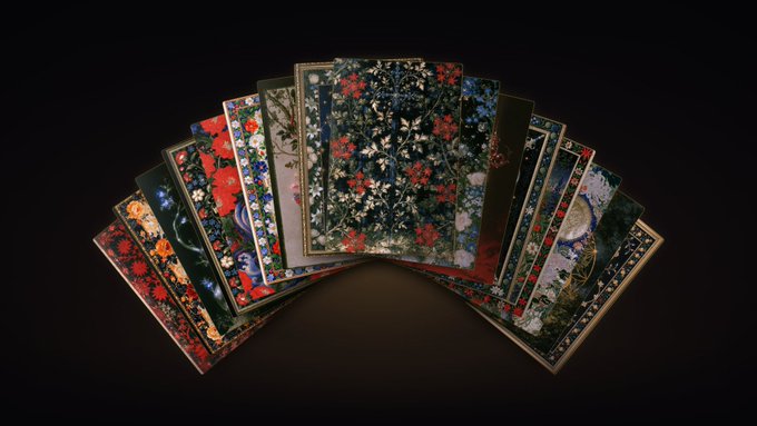 A fan-shaped arrangement of ornate playing cards featuring intricate floral and nature patterns is displayed against a black background.