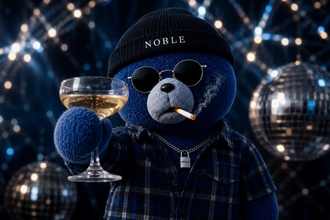 A blue plush teddy bear wearing a black beanie reading 'NOBLE', round sunglasses, a gold chain, and a plaid shirt holds a glass of white wine while smoking a cigarette against a backdrop of disco balls and twinkling lights.