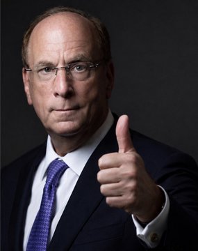 Larry Fink, CEO of BlackRock, gives a thumbs-up while wearing a suit and tie. The caption ties into the post's bullish message about Bitcoin and ticker $TBB, with Fink's approving gesture symbolizing endorsement of the crypto rally.