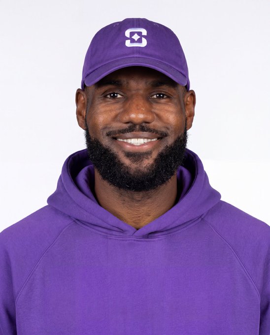 The image shows a smiling man with a beard wearing a purple cap featuring a "C" logo and a matching purple hoodie, appearing to be an official team headshot.

The post "Shuffle in 7" likely references his jersey number 7, suggesting he is a player on the team whose logo (the "C") appears on his cap.