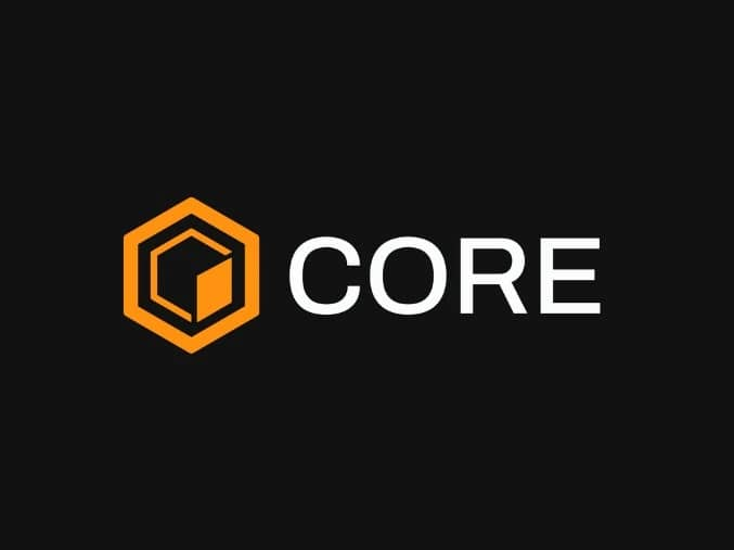 A logo featuring an orange hexagonal cube icon alongside the white text "CORE" on a black background, representing the Core DAO brand associated with the reported all-time high in $CORE staking activity.