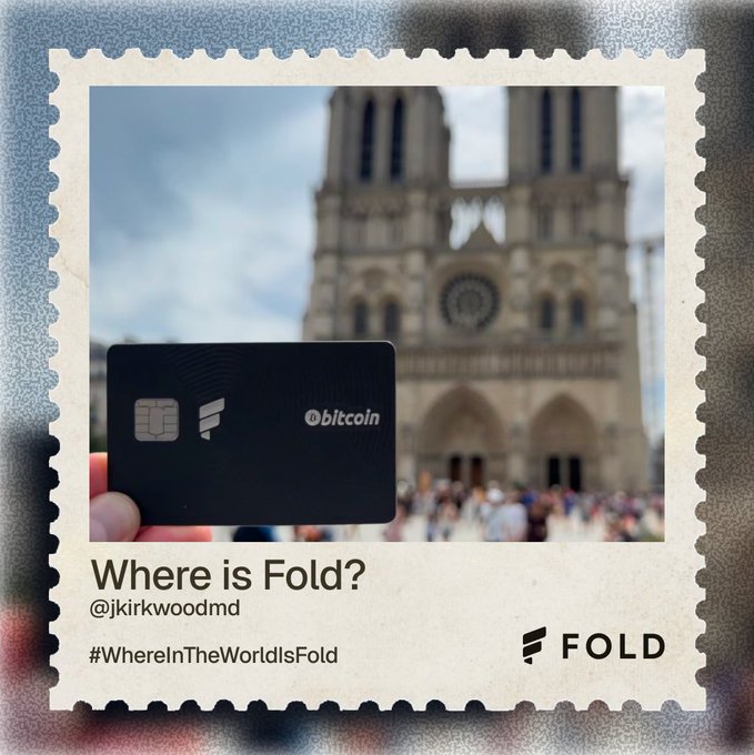 A Fold Bitcoin card (@bitcoin) is held up in front of Notre Dame Cathedral in Paris, part of a 'Where is Fold?' campaign tagged #WhereInTheWorldIsFold by @jkirkwoodmd.