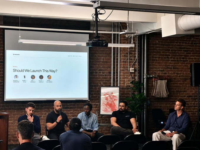 The image shows a panel discussion titled "Should We Launch This Way?" featuring founders Rayan (TopHatDAO), Haseeb Qureshi (Dragonfly), Um (Parallel), Philip Rosedale (Rosen), and Kevin (Goldenchub) at a MANTRA Meetup in 2024, where a representative joins the pre-ICO founder panel alongside fellow startup leaders in a brick-walled venue.