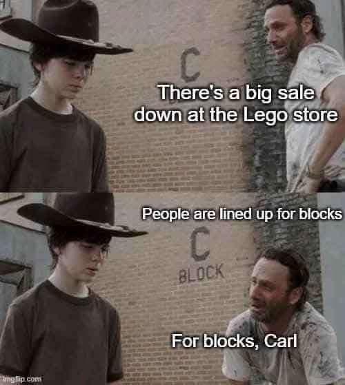 A two-panel meme from The Walking Dead featuring Carl Grimes and Rick Grimes, with Rick humorously explaining, "There's a big sale down at the Lego store... People are lined up for blocks... For blocks, Carl," playing on the word 'blocks.'