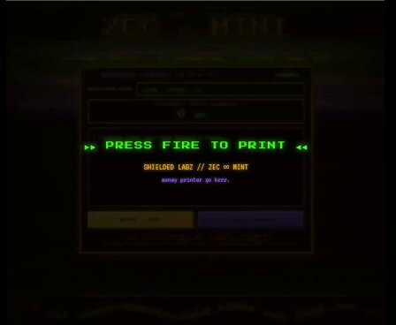 The image shows a computer screen with a message that reads "Press fire to print", which appears to be a command prompt for a printer. There are two buttons visible, one labeled "SHIELDED LAB" and another labeled "ZEC MINT". The background of the image is black, making it stand out against the white text on the screen.