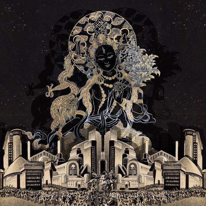 An intricate black and gold illustration of a deity figure holding a lotus flower, seated above a detailed cityscape with a crowd of people.