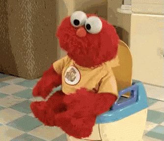 The image features a red stuffed animal figure, likely an Elmo doll or character from Sesame Street, sitting inside of a toilet seat with its lid up. The stuffed toy appears to be quite large compared to the actual size of the toilet seat. In the background, there is another smaller toy, possibly more in line with a child's plaything design. A text at the bottom of the image says "Once Americans really start to cut back on spending the USA economy will tank". This suggests that the economic conditions might be unfavorable, which could potentially impact the value and demand for toys like this oversized red stuffed animal figure or other collectibles, such as coins or precious metals.