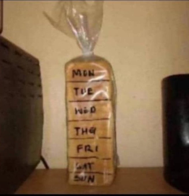 A homemade pill organizer made from a plastic bag with handwritten labels for each day of the week (MON through SUN).