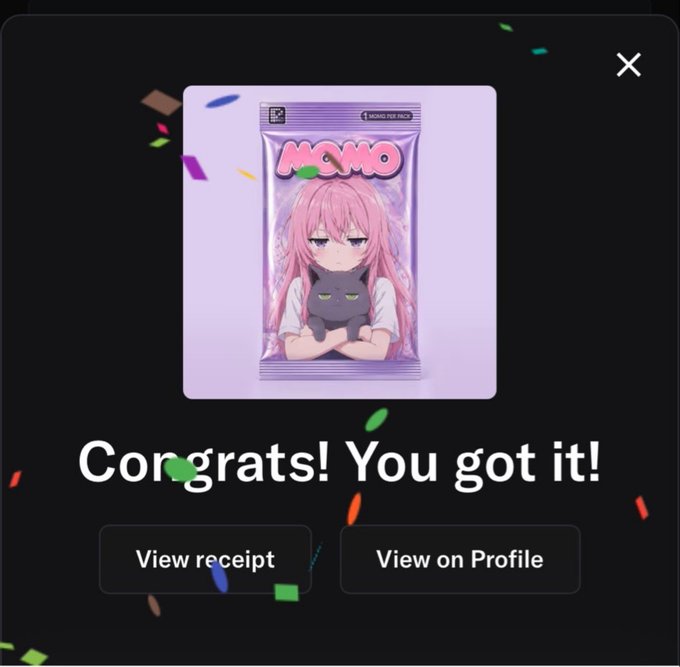 A nearly identical 'Congrats! You got it!' screen showing the MOMO anime NFT card with a pink-haired girl and black cat, with confetti animation on a dark background.