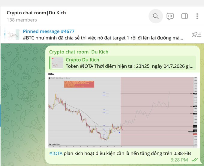 A screenshot of a Telegram crypto chat room called "Crypto chat room | Du Kich" showing a pinned message (#4677) discussing BTC targets, and a current message from "Crypto Du Kich" featuring an IOTA price chart dated 04.7.2026 with the caption "#IOTA plan kích hoạt điều kiện cần là nền tảng đóng trên 0.88-FIB," indicating that IOTA needs to close above the 0.88 Fibonacci level to activate the posted trading plan.