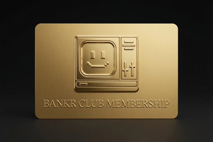 A gold metallic card with an embossed design featuring a retro computer with a smiley face and the text 'BANKR CLUB MEMBERSHIP'.