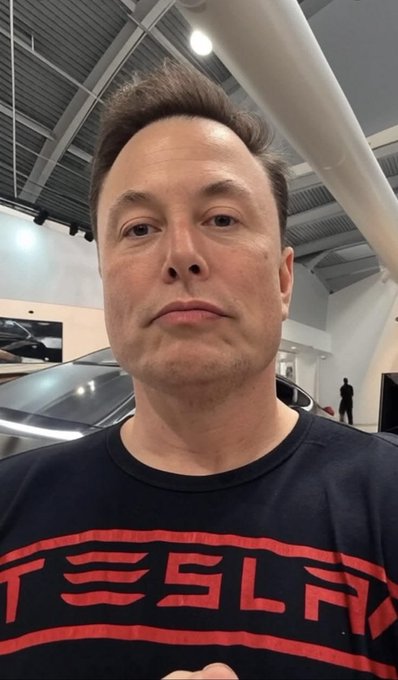 A man wearing a black Tesla t-shirt takes a selfie, identified in the post as Elon Musk, posing a rhetorical question about early adopters of his platform X in a multiple-choice format. The image reinforces the post's theme by featuring Musk himself, the owner of X, humorously tying the question of being "early" to his personal brand.