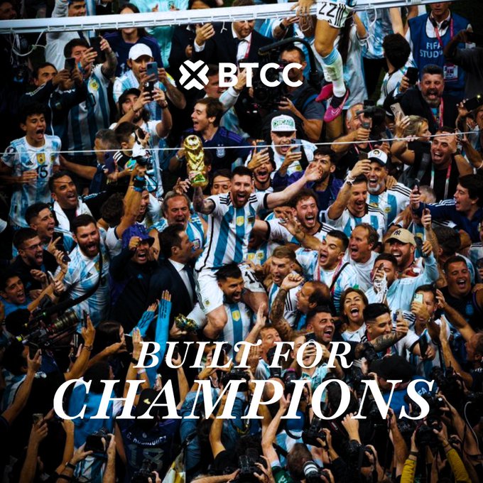 The image shows a large group of people, possibly soccer players or fans, gathered together with their arms raised high in celebration. The crowd appears to be cheering for someone who has achieved something significant, such as winning a championship. There are several individuals holding up cell phones and cameras, capturing the moment. The post also mentions that this is related to the "built for champions" movement, which could imply that the group of people gathered here represents a team or individual who has overcome challenges and accomplished great things in their field.