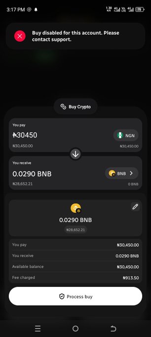 A mobile app screenshot showing a 'Buy Crypto' interface where 30,450 NGN (₦30,450.00) is being exchanged for 0.0290 BNB, with an error message at the top stating 'Buy disabled for this account. Please contact support.' and a 'Process buy' button at the bottom.