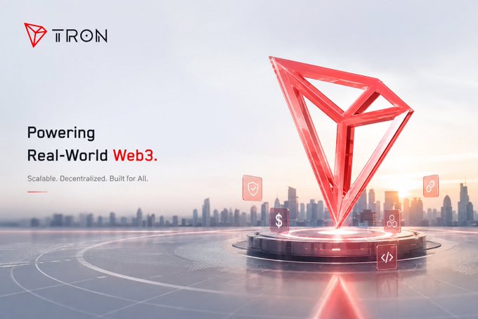 A promotional banner for the TRON blockchain with the tagline "Powering Real-World Web3." and "Scalable. Decentralized. Built for All." featuring a red diamond-shaped TRX logo over a futuristic cityscape.