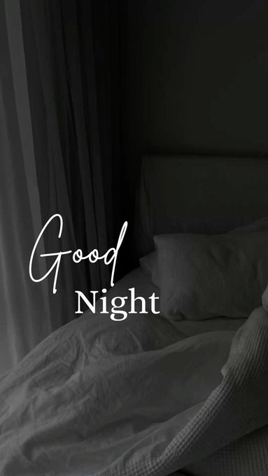A dimly lit bedroom scene with rumpled white bedding and pillows, featuring the text 'Good Night' in white script and serif fonts.