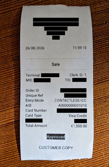 A printed Visa Credit sale receipt from 26/08/2026 showing a contactless transaction of €1,500.00, marked as Approved (Customer Copy), with sensitive details redacted.