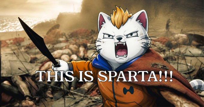 A meme image featuring an angry cartoon cat character wearing an orange hoodie and red cape, holding a spear against a battlefield background, with the text 'THIS IS SPARTA!!!' overlaid.
