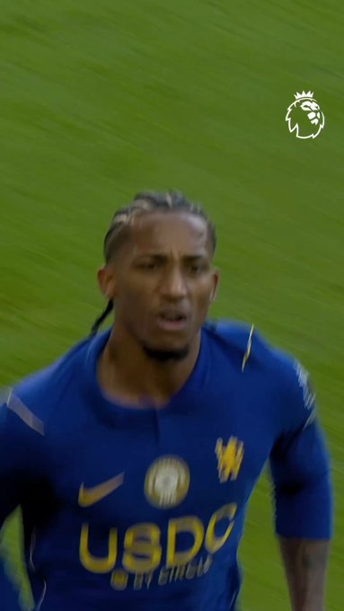 A soccer player in a blue jersey featuring the "USDC by Circle" sponsor logo runs across a green field, with the Premier League logo visible in the corner. The jersey's USDC branding ties directly into the post's theme of staying in motion like the cryptocurrency.