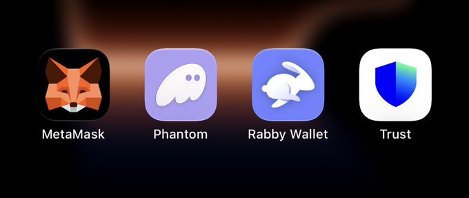 Four cryptocurrency wallet app icons displayed in a row: MetaMask (fox logo), Phantom (ghost logo), Rabby Wallet (rabbit logo), and Trust (shield logo).