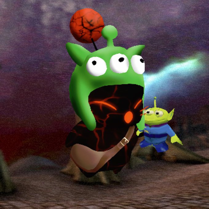 A surreal digital image showing a three-eyed green alien character with a red cracked planet on its head, wearing a satchel, standing in a barren landscape next to a small green toy alien figure.