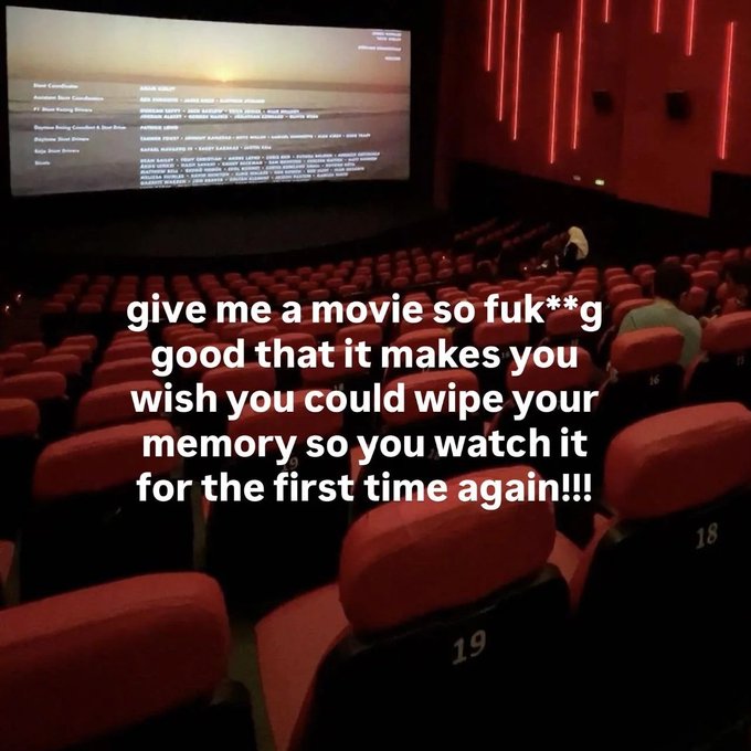 A movie theater with red seats and a screen showing end credits, overlaid with text asking for a movie recommendation so good you'd wish to wipe your memory to rewatch it for the first time.