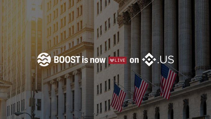 The image shows the facade of a grand classical building with American flags hanging from its exterior, overlaid with text reading "BOOST is now LIVE on .US" alongside the Sei and Binance.US logos. This visual reinforces the announcement of the Sei x Binance.US boost campaign, with the American flags and U.S. financial district architecture symbolizing the promotion's American market availability through July 30.