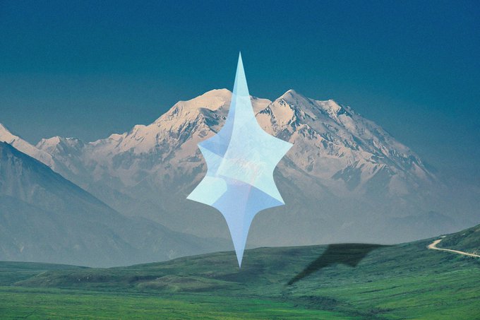 A translucent geometric star logo overlaid on a scenic mountain landscape.