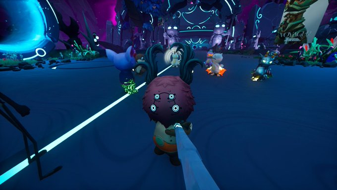 A screenshot from a stylized 3D video game featuring a multi-eyed character holding a weapon in a vibrant, neon-lit fantasy environment.