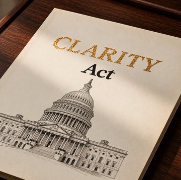 A printed document titled "CLARITY Act" features an illustration of the U.S. Capitol building, visually representing the legislative bill that just lost a key opponent when the National Sheriffs' Association dropped its opposition to the crypto regulation legislation.