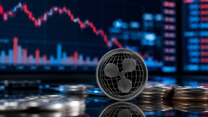 The image shows a close-up view of a coin with three symbols on its surface, which appears to be a digital currency called Ripple. The coin is surrounded by various coins scattered around it. In the background, there are charts and graphs representing market trends in cryptocurrency trading. The text "Santiment says XRP market sentiment has cooled sharply, but that could actually increase the chances of a short-term rebound according to the report", which suggests that Ripple's value might be affected by recent market conditions.