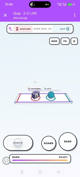 A mobile screenshot of the Quip app showing a live 2-0 sumo duel between users 'sexycrypto' and 'asrof' with action buttons for SHOVE, GUARD, and DASH.