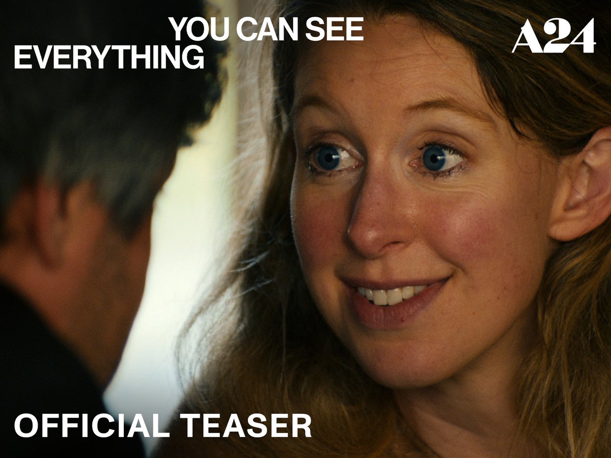 An A24 official teaser image showing a woman with blue eyes smiling intensely, with text reading 'YOU CAN SEE EVERYTHING' and 'OFFICIAL TEASER'.