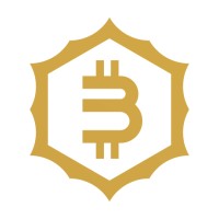 The image features a gold Bitcoin (₿) logo—a stylized "B" with vertical lines—set within a shield-like emblem, symbolizing strength and security. This visually reinforces the post's reference to Bitcoin's origins, including its homage to Wei Dai's b-money concept and the cypherpunk ideals of decentralized digital currency.