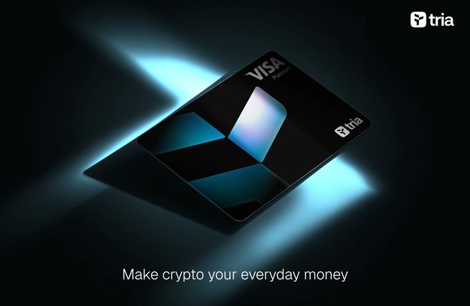 A promotional image for a 'Tria' Visa Platinum debit card with a dark, geometric design, accompanied by the tagline 'Make crypto your everyday money.'