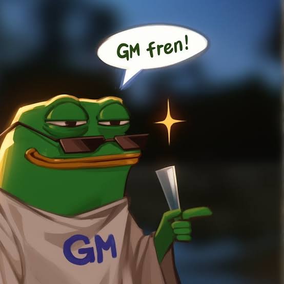 A cartoon Pepe the Frog wearing sunglasses and a white shirt labeled 'GM' says 'GM fren!' in a speech bubble, holding what appears to be a glass, against a dark blue starry background.