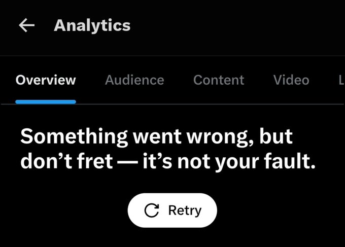 The screenshot shows Twitter/X's Analytics page displaying an error message that reads, "Something went wrong, but don't fret — it's not your fault," with a Retry button below. This directly relates to the user's post, confirming that their analytics aren't loading due to a platform-side error rather than an issue on their end.