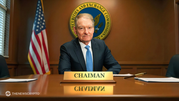 The image features a man sitting at a desk with his hands clasped together in front of him. The man appears to be dressed in a suit and tie, suggesting that he might be a high-ranking official or a member of the SEC. In the background, there is an American flag, which further emphasizes the setting as being within the U.S. government building.

The image also contains text that reads "SEC Chair Paul Atkins expressed confidence that Congress will pass crypto market structure legislation," and it includes the names "Paul Atkins" and "SEC Chair." This suggests that the man sitting at the desk might be involved in discussions or negotiations related to cryptocurrency regulations, as he is described as a "SEC Chair" who has confidence in passing such legislation.