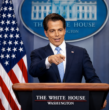 A man in a dark suit and light blue tie stands at a White House press briefing podium, pointing forward emphatically. The podium displays "THE WHITE HOUSE WASHINGTON" and an American flag is visible to the left.

The image appears unrelated to the accompanying post about Anthony Scaramucci's comments on the CLARITY Act, as the setting (a White House press room) and the speaker's appearance do not match the SkyBridge Capital founder mentioned in the caption.