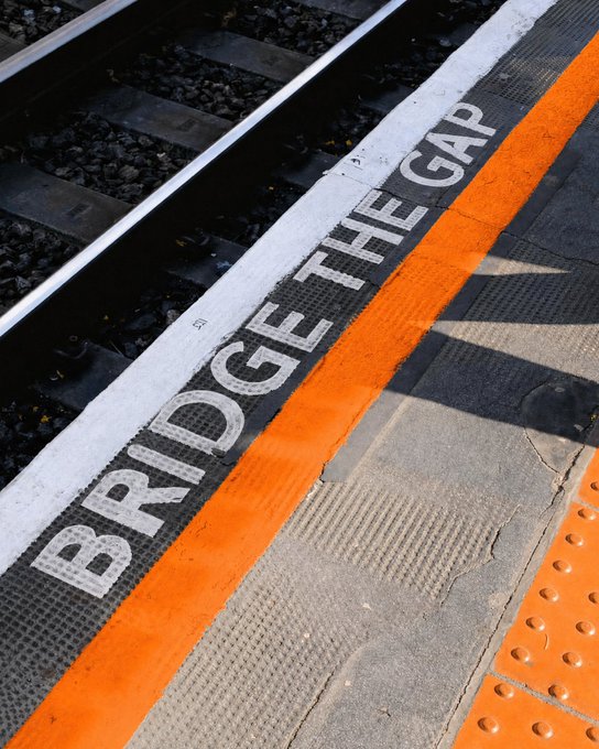 The image shows an orange line running down the center of a train track with the words "Bridges" written above it, indicating that there are bridges between where finance was and where it's going. The text also mentions a new financial platform, suggesting that this might be related to the development or expansion of such platforms in the future.